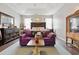 Bright main bedroom with a tray ceiling, sitting area, decorative accents, and carpet at 113 Cat Tail Bay Dr., Conway, SC 29527