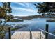 Beautiful view from the private wooden dock with stainless steel railings overlooking the tranquil marshland and clear skies at 118 Ellington Ln., Pawleys Island, SC 29585