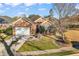 Beautiful brick home with a well-kept lawn, driveway, and inviting front entrance at 118 Ellington Ln., Pawleys Island, SC 29585