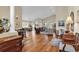 Spacious living room with hardwood floors and multiple seating areas with lots of light at 118 Ellington Ln., Pawleys Island, SC 29585