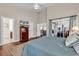 Spacious main bedroom featuring hardwood floors, large windows, and backyard access at 118 Ellington Ln., Pawleys Island, SC 29585