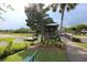 Picturesque waterfront scene with a gazebo, a dock, and scenic natural beauty at 118 Ellington Ln., Pawleys Island, SC 29585