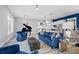 Open concept living area with piano, comfortable seating, a modern kitchen and stylish decor at 125 Harbor Oaks Dr., Myrtle Beach, SC 29588