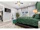 Inviting main bedroom with ensuite bathroom access, bright windows, and tasteful decor at 125 Harbor Oaks Dr., Myrtle Beach, SC 29588