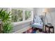 Cozy reading nook with natural light, comfortable armchair, and tranquil outdoor views at 125 Harbor Oaks Dr., Myrtle Beach, SC 29588