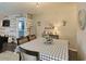 Bright dining area featuring decor, wood floors, and plenty of seating at 127 Clover Walk Dr., Conway, SC 29526