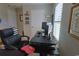 Functional home office featuring a large desk, comfortable chair, and ample natural light at 127 Clover Walk Dr., Conway, SC 29526