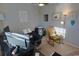 Functional home office featuring a large desk, comfortable chair, and ample natural light at 127 Clover Walk Dr., Conway, SC 29526