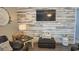Cozy living room with shiplap accent wall, modern decor, and comfortable seating arrangement at 127 Clover Walk Dr., Conway, SC 29526