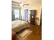 Inviting bedroom with wood flooring and a peaceful ambiance at 13 Daniel Morrall Ln., Georgetown, SC 29440