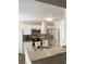 Bright kitchen with stainless steel appliances, granite countertops, and a modern sink at 13 Daniel Morrall Ln., Georgetown, SC 29440