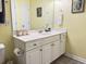 Bright bathroom features a single sink vanity with white countertop and cabinets, with decor and a large mirror at 135 Butkus Dr. # 5, Myrtle Beach, SC 29588