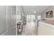 Light and airy foyer featuring wood floors, neutral walls and a view into the living area at 135 Butkus Dr. # 5, Myrtle Beach, SC 29588