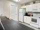 Modern kitchen with stainless steel appliances, ample counter space, and stylish fixtures and finishes at 135 Butkus Dr. # 5, Myrtle Beach, SC 29588