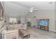 Comfortable living room with vaulted ceiling, wood floors and an open concept to the dining and kitchen at 135 Butkus Dr. # 5, Myrtle Beach, SC 29588