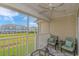 Screened porch with seating area, ceiling fan, view of the property and neighborhood at 135 Butkus Dr. # 5, Myrtle Beach, SC 29588