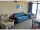 Cozy living room with comfortable seating and access to a balcony with a view at 1501 S Ocean Blvd. # 1546, Myrtle Beach, SC 29577