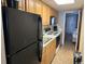 Efficiency kitchen equipped with standard appliances and ample counter space at 1501 S Ocean Blvd. # 935, Myrtle Beach, SC 29577
