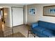Relaxing living area with pull out bed and a glimpse into the bathroom and kitchen at 1501 S Ocean Blvd. # 935, Myrtle Beach, SC 29577