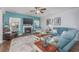Inviting living room with fireplace, decoratively adorned with coastal accents and comfortable seating at 172 Board Landing Circle, Conway, SC 29526