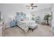 Serene main bedroom featuring a coastal-themed decor, a ceiling fan, and carpet floors at 172 Board Landing Circle, Conway, SC 29526