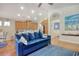 Open floor plan showing the kitchen and dining room, with a large sofa and coastal decor at 1878 Heritage Loop, Myrtle Beach, SC 29577