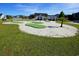 A community putting green with sand traps and palm trees at 1878 Heritage Loop, Myrtle Beach, SC 29577