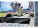 A wooden swing in a community park setting with landscaping at 1878 Heritage Loop, Myrtle Beach, SC 29577