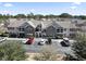 Inviting multi-Gathering residential building featuring brick accents, balconies, and a well-maintained parking area at 200 Vendura Ct. # B, Murrells Inlet, SC 29576