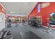 Well-equipped gym with treadmills, bikes, weight machines, and natural light from multiple large windows at 200 Vendura Ct. # B, Murrells Inlet, SC 29576