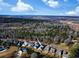 Aerial view of the home and the neighborhood, with a view of the river in the distance at 202 Spreading Oak Dr., Pawleys Island, SC 29585