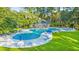 Large community pool with ample seating and a charming pool house at 202 Spreading Oak Dr., Pawleys Island, SC 29585