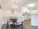 Charming dining area next to the kitchen with a table perfect for meals and gatherings at 2033 Silvercrest Dr. # 21 B, Myrtle Beach, SC 29579