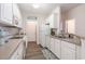 Well-lit kitchen with white cabinets, modern appliances, and plenty of counter space at 2033 Silvercrest Dr. # 21 B, Myrtle Beach, SC 29579