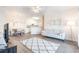Spacious living space featuring an open-concept living room, dining area, and kitchen with hardwood floors at 2033 Silvercrest Dr. # 21 B, Myrtle Beach, SC 29579
