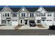 New townhomes show modern exterior, garages, and neutral paint scheme at 2053 Nw Parow Ln Nw # B, Calabash, NC 28467