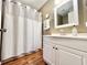 Bathroom featuring a vanity with storage and a shower with a curtain at 210 Double Eagle Dr. # G1, Myrtle Beach, SC 29575