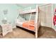 Bright bedroom showcases a bunk bed with a white frame and a beach-themed decor at 210 Double Eagle Dr. # G1, Myrtle Beach, SC 29575