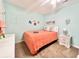 Cozy bedroom features a twin bed, ceiling fan, and beach-themed decor accents at 210 Double Eagle Dr. # G1, Myrtle Beach, SC 29575