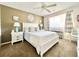 Bedroom features a comfortable queen bed, a ceiling fan, and matching nightstands at 210 Double Eagle Dr. # G1, Myrtle Beach, SC 29575