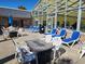 Outdoor area with lounge chairs, tables, and fire pit for relaxation and entertaining at 210 Double Eagle Dr. # G1, Myrtle Beach, SC 29575