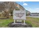 Canterbury Village sign invites you to a community with manicured grounds and a peaceful setting at 2970 Old Bryan Dr. # A5, Myrtle Beach, SC 29577