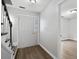 The home's entryway with wood floors and an adjacent staircase welcomes visitors at 2970 Old Bryan Dr. # A5, Myrtle Beach, SC 29577