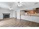 Open living area with a fireplace and an eat-in kitchen with a breakfast bar at 2970 Old Bryan Dr. # A5, Myrtle Beach, SC 29577