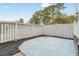 Fenced backyard patio with gray concrete and black mulch at 2970 Old Bryan Dr. # A5, Myrtle Beach, SC 29577