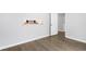 An empty room with light gray walls and wood floors offers a blank canvas at 2970 Old Bryan Dr. # A5, Myrtle Beach, SC 29577