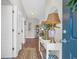 Stylish entryway featuring a decorative table, lamps, and a charming rug at 309 Lake Mist Ct. # 309, Longs, SC 29568