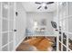 Bright office space with a modern white desk, stylish decor, and hardwood floors at 309 Lake Mist Ct. # 309, Longs, SC 29568