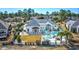 Aerial view of a home with a backyard pool and outdoor entertainment area at 3100 Lahinch Dr., Myrtle Beach, SC 29579
