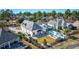 Aerial view of a home with a well-manicured lawn and fenced backyard, showcasing its peaceful setting at 3100 Lahinch Dr., Myrtle Beach, SC 29579